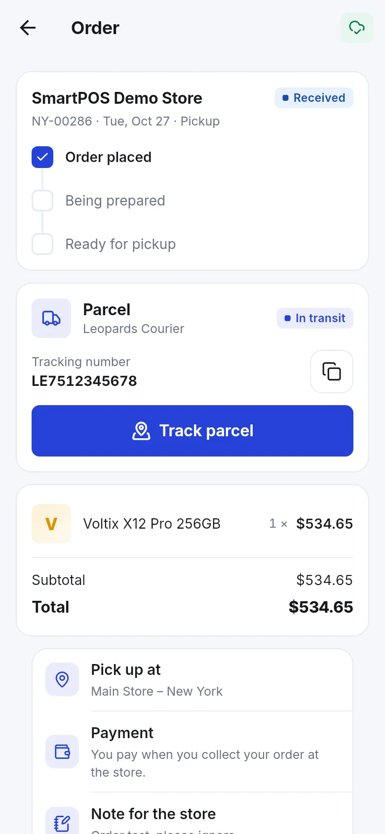 Order page with a Parcel card showing the courier, status In transit, the tracking number with a copy button and a Track parcel button